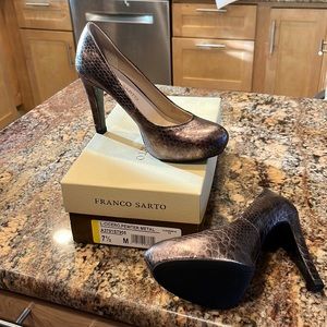 Never been worn size 7.5 Franco Sarto Pewter 4” heels.